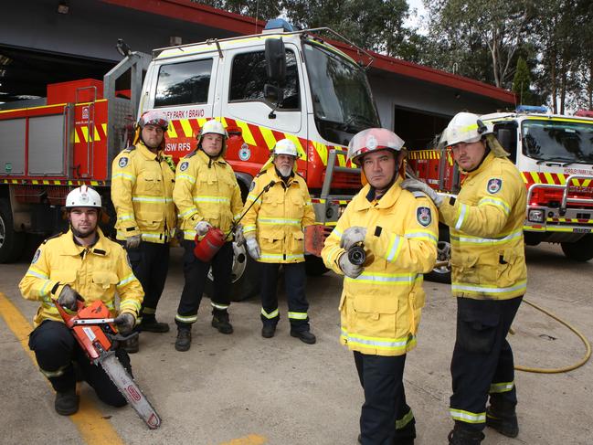 Members of the NSWRFS Horsley Park Rural Fire Brigade (L-R) Ben Robb, Anthony Ciccaldo, Ethan Makin, Frank Harris, Captain Darren Nation and Corey Lyons pose for a photo at Horsley Park, Thursday, 23rd August 2018. The NSWRFS Horsley Park Rural Fire Brigade are preparing for an intense fire season as a fireban has come early. (AAP Image / Robert Pozo).