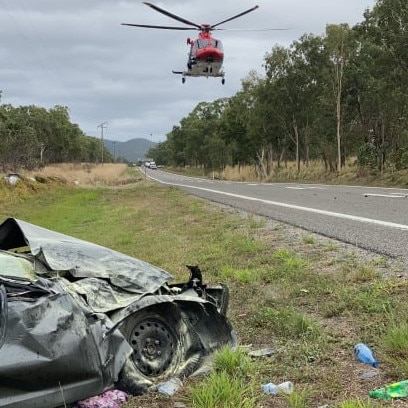 The rescue chopper takes off from the crash site.