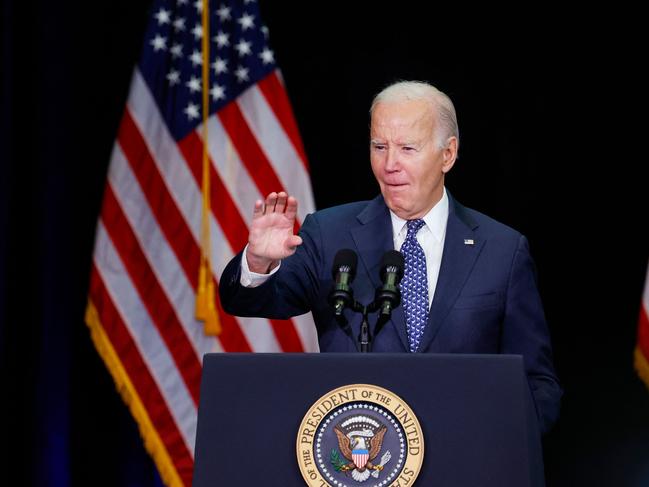 LEESBURG, VIRGINIA - FEBRUARY 08: U.S. President Joe Biden waves as he arrives to speak at the annual House Democrats 2024 Issues Conference on February 08, 2024 in Leesburg, Virginia. House Democrats met for the annual retreat outside of Washington, DC to discuss a range of issues ahead of the upcoming election.   Anna Moneymaker/Getty Images/AFP (Photo by Anna Moneymaker / GETTY IMAGES NORTH AMERICA / Getty Images via AFP)