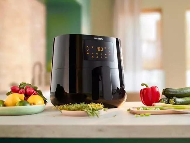 The battle of the air fryer bargains continues as Big W cuts the Philips Digital Air fryer XL to half price. Image: Philips.