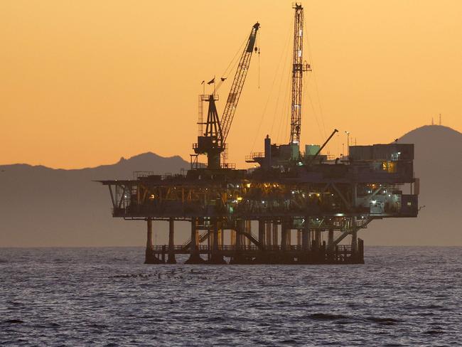 SEAL BEACH, CALIFORNIA - JANUARY 05: A view of offshore oil and gas platform Esther in the Pacific Ocean on January 5, 2025 in Seal Beach, California. President Joe Biden will reportedly permanently ban future offshore oil and gas drilling in over 625 million acres of federal waters in an effort to cement his environmental legacy before President-elect Donald Trump is inaugurated January 20th. Platform Esther is located approximately 1.5 miles away from Seal Beach and operates within California state waters.   Mario Tama/Getty Images/AFP (Photo by MARIO TAMA / GETTY IMAGES NORTH AMERICA / Getty Images via AFP)