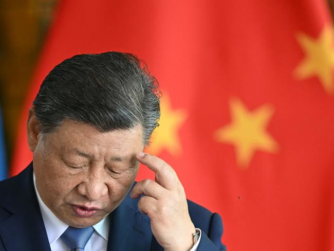 China's President Xi Jinping speaks as he and Brazil's President Luiz Inacio Lula da Silva give a joint statement to the press after a meeting at Planalto Palace in Brasilia on November 20, 2024. China's President Xi Jinping is on a state visit to Brazil, fresh off a warm reception at summits of the G20 and APEC groups, both held under the cloud of Donald Trump's White House return. (Photo by EVARISTO SA / AFP)