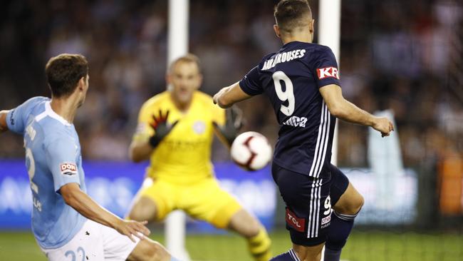 Kosta Barbarouses surprises Eugene Galekovic to equalise. Picture: AAP