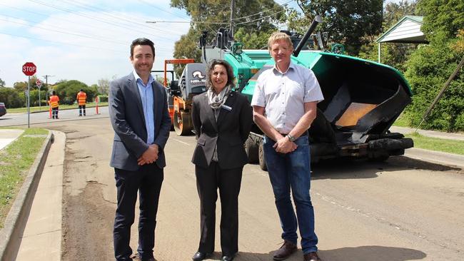 Councillors Peter Castaldo, Alison Champion, and Tom Melican at the laying of the recycled road in Watsonia