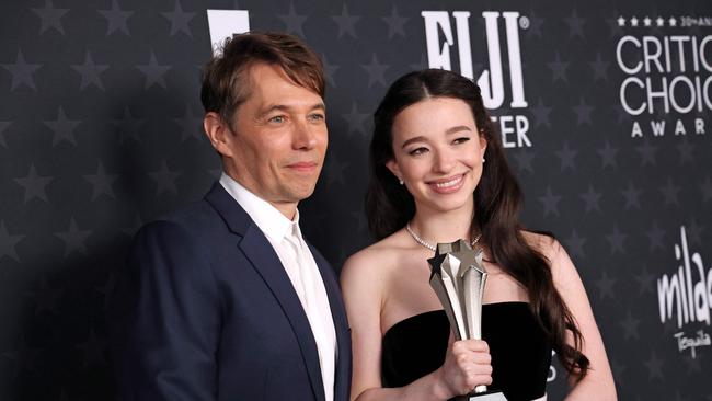 US director Sean Baker and actress Mikey Madison pose with the best picture award for Anora in the press room during the 30th Annual Critics Choice Awards at Barker Hangar in Santa Monica. Picture: AFP