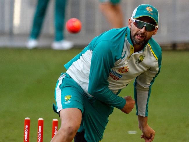 Australia's Nathan Lyon bowls during a practice session at Adelaide Oval on December 14, 2021, ahead of the second Ashes cricket Test match against England in Adelaide. (Photo by Brenton Edwards / AFP) / -- IMAGE RESTRICTED TO EDITORIAL USE - STRICTLY NO COMMERCIAL USE --