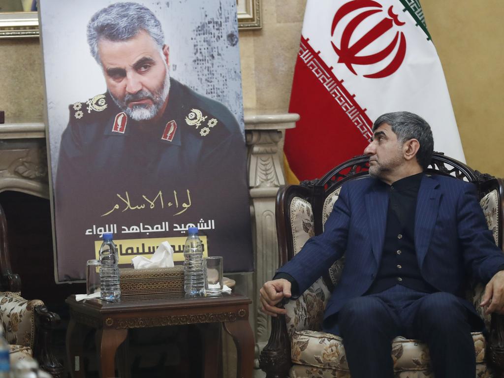 Iran's Ambassador to Lebanon Mohammed Jalal Feiruznia looks to a portrait of Gen. Qassem Soleimani, as he receives condolences at the Iranian embassy, in Beirut, Lebanon, January 3. Picture: AP/Hussein Malla