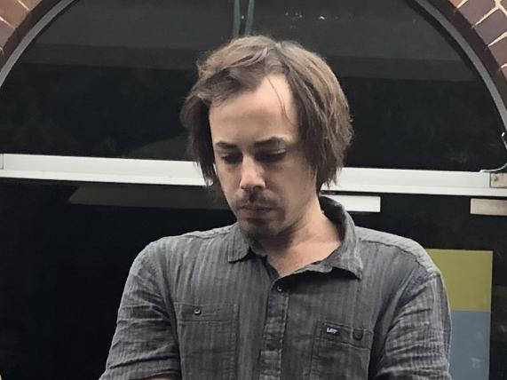 Mark Edward Attalla is led out of Manly Court House by police after  being convicted of pointing a handgun at a family in a car and a man he had an argument with on the bus. He was sentenced to 15 months in jail.  Picture: Jim O'Rourke