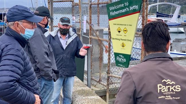 Boat owners plead their case with Parks Victoria staff as Fisherman’s Jetty is closed.jpg