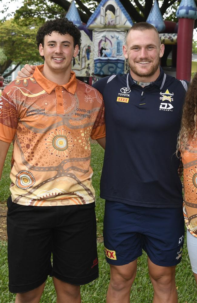 Elijah Tapau-Taylor has always had a massive frame, seeing eye-to-eye with Cowboys forward Coen Hess in 2021 as a year 10 student. Picture: Supplied