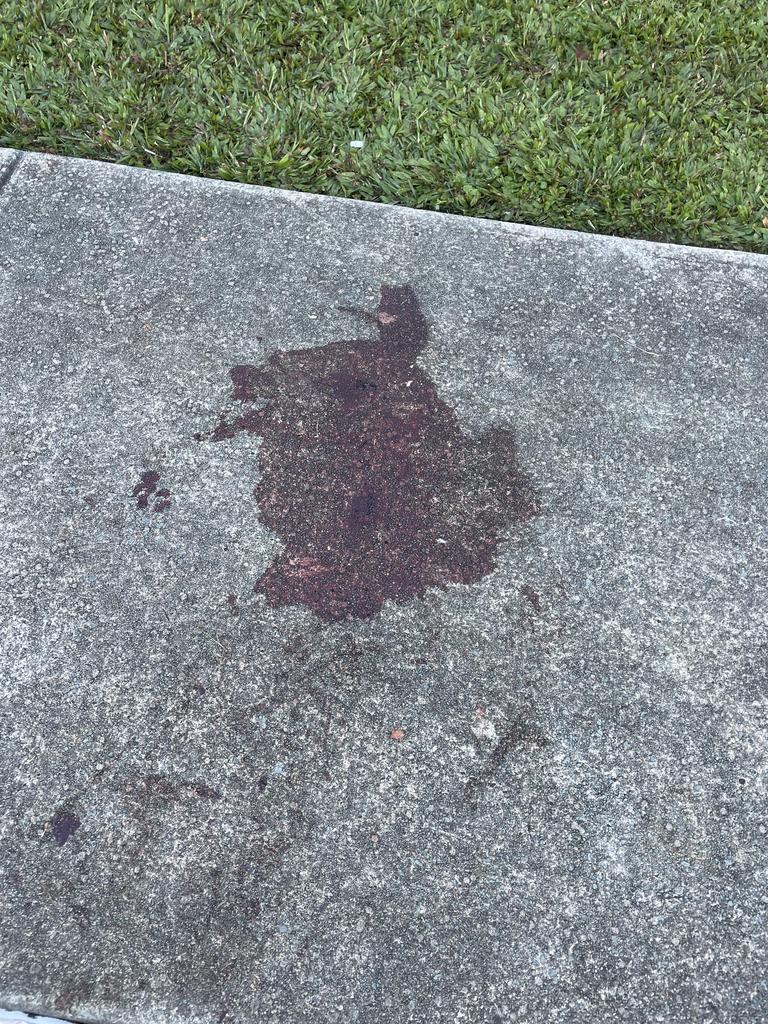 Blood seen on the footpath close to the property. Picture: Andreas Nicola