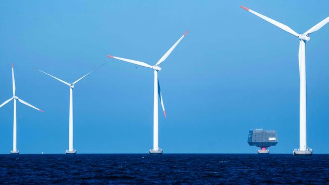 Picture taken on September 4, 2023 shows windmills at the Nysted Offshore Wind Farm constructed by Danish windpower giant Orsted in 2002-2003 in the Baltic Sea near Gedser in Denmark. Long dependent on fossil fuels before emerging a champion of offshore wind power, Danish company Orsted is now struggling to restore its business after a year that saw it drop several major projects. The cancellation of a huge offshore wind farm project in the United States at the end of 2023, accompanied by nearly $4 billion in write-downs, have spotlighted the challenges faced by the Danish group as it seeks to transform. (Photo by Thomas Traasdahl / Ritzau Scanpix / AFP) / Denmark OUT