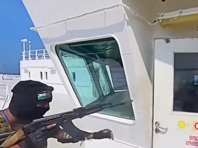 Yemen's Houthis rebels seizing a cargo ship in the southern Red Sea last year.