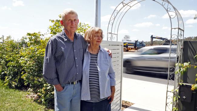 Sue and Peter Coles outside their Leppington, where a developer has cut their front yard space down dramatically. Picture: Sam Ruttyn