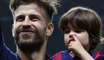 BERLIN, GERMANY - JUNE 6: Gerard Pique of Barcelona and his son Milan Pique Mebarak celebrate the victory after the UEFA Champions League Final between Juventus Turin and FC Barcelona at Olympiastadion on June 6, 2015 in Berlin, Germany. (Photo by Jean Catuffe/Getty Images)