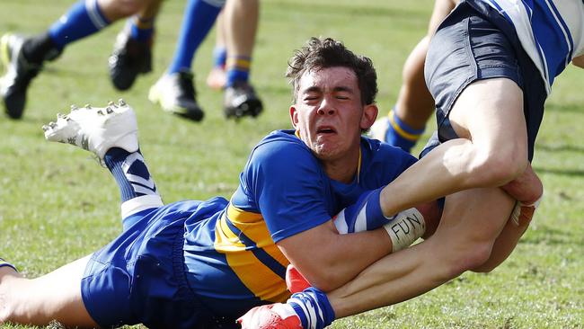 Toowoomba’s Wihan Kruger making a tackle on Nudgee College’s Torey Bath. Picture: Tertius Pickard