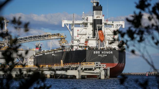 A ship is loaded with coal at Newcastle. Picture: Liam Driver