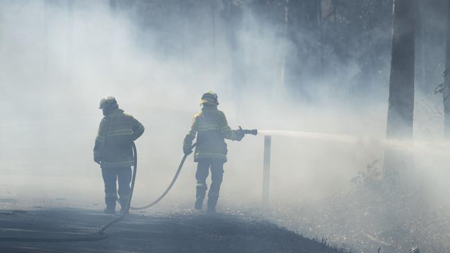 Firefighters at Possum Brush south of Taree. Picture: John Feder.