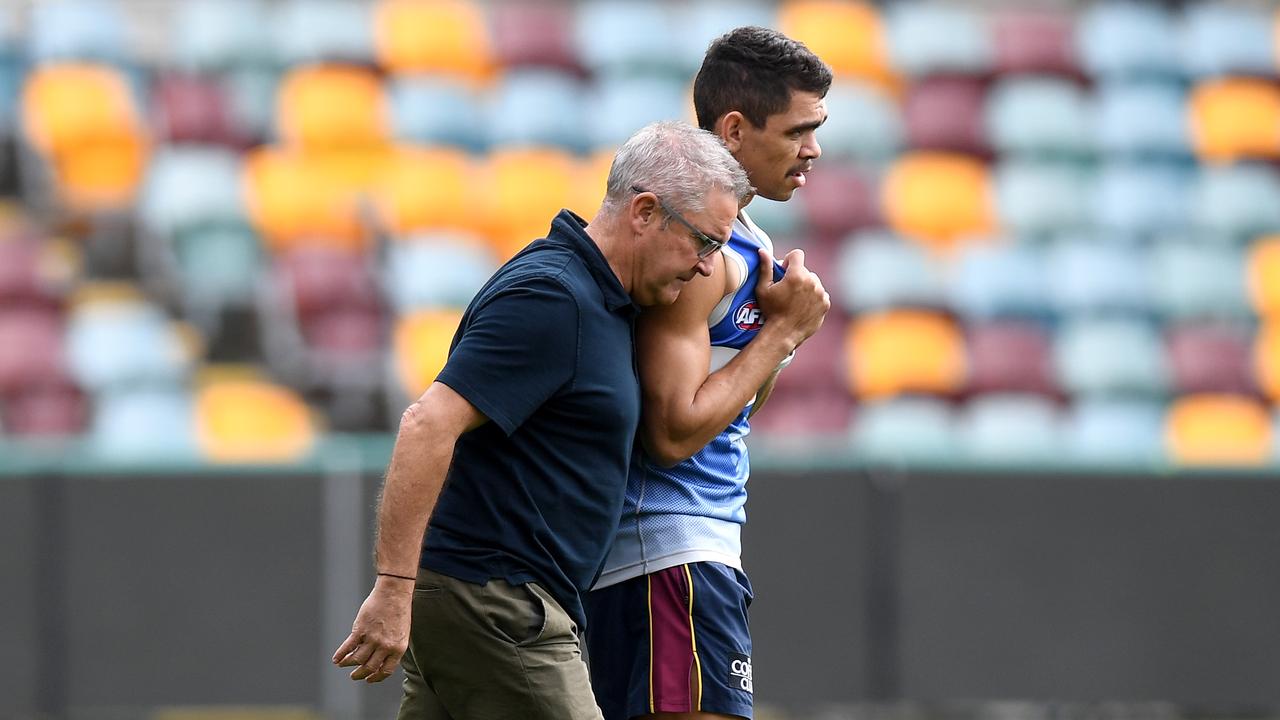 Charlie Cameron chats with Chris Fagan during a session last week.