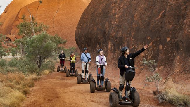 Riding Segways at Uluru. Picture supplied by Brent Carraill