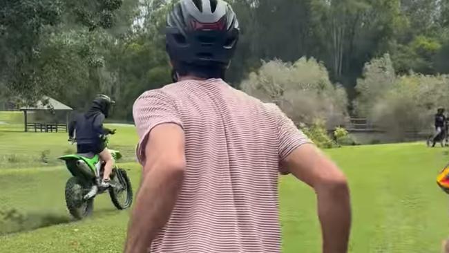 Parents on bikes with young children confront teenagers terrorising park users at Mudgeeraba in the Gold Coast hinterland.