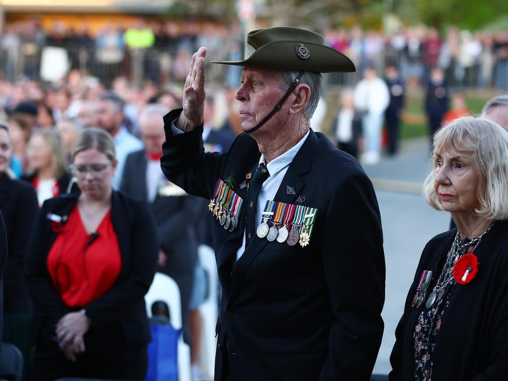 Members of the public and veterans attend the ANZAC dawn service on April 25, 2024 in Currumbin, Australia. (Photo by Chris Hyde/Getty Images)
