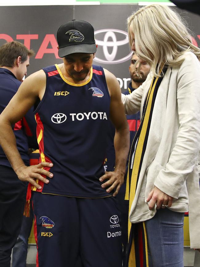 Eddie Betts and his wife Anna in the rooms after the loss. Picture: Sarah Reed