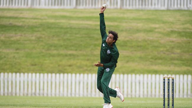 D'Arcy Satharasinghe bowls for Brisbane Boys College. Picture: Kevin Farmer