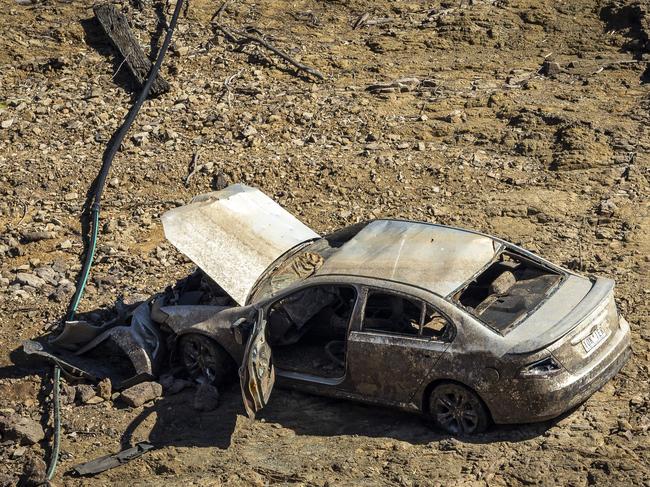 Locals say more than 30 vehicles have been left along the river. Picture: Jake Nowakowski