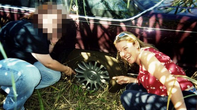 Rachelle Childs (23) of Bargo with a friend &amp; bogged car while on holiday. Picture: Supplied