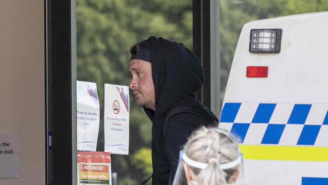 A man is transferred to the Fountainside Accomodation in Hobart. Picture Eddie Safarik