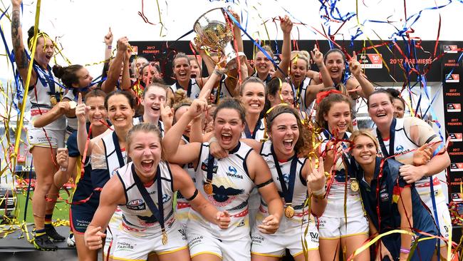 Adelaide Crows players celebrate winning the AFLW Grand Final game against Brisbane Lions at Metricon Stadium in Carrara on the Gold Coast, Saturday, March 25, 2017. (AAP Image/Dan Peled) NO ARCHIVING, EDITORIAL USE ONLY