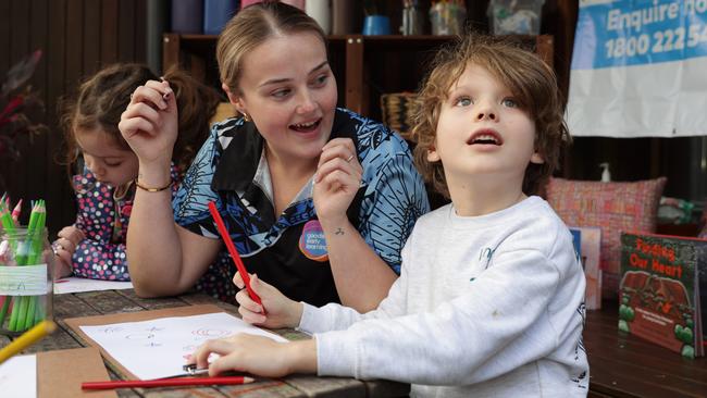 Goodstart East Sydney Early Learning Centre director Kim Boland with Tilly, 4, and Oskar, 5. Picture: Jane Dempster