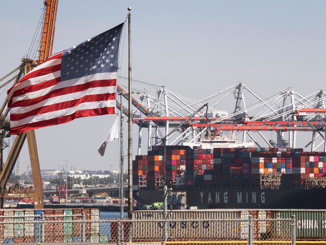 Shipping containers from China and other Asian countries are unloaded at the Port of Los Angeles as the trade war continues between China and the US, in Long Beach, California on September 14, 2019. - China announced it will exempt soybeans and pork from its retaliatory tariffs, a hugely symbolic move to appease Trump ahead of a new round of talks due next month. (Photo by Mark RALSTON / AFP)