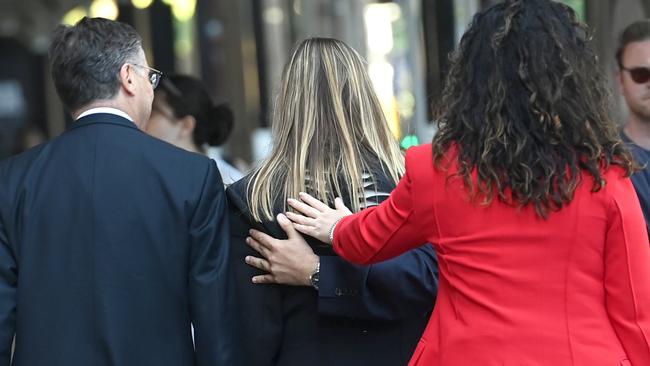 She was led away from the building by her lawyers. Picture: NCA NewsWire / Jeremy Piper