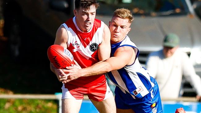 Luke McComb (right) will miss two to four matches with a shoulder injury. Picture: Field of View Photography