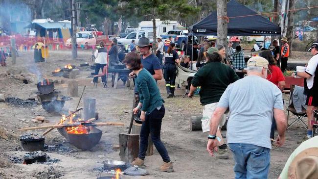 BURNING AMBITION: The comp gets under way. Picture: Nymboida Camp Oven Festival