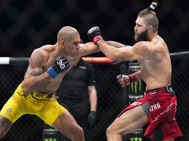 NEW YORK, NEW YORK - NOVEMBER 11: Alex Pereira of Brazil punches Jiri Prochazka of the Czech Republic in the UFC light heavyweight championship fight during the UFC 295 event at Madison Square Garden on November 11, 2023 in New York City. (Photo by Jeff Bottari/Zuffa LLC via Getty Images)