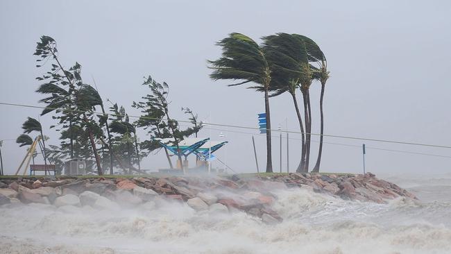 Strong winds are seen hitting a section of The Strand on February 3, 2011 in Townsville, Australia. (Photo by Ian Hitchcock/Getty Images)