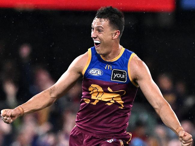 BRISBANE, AUSTRALIA - MAY 29: Hugh McCluggage of the Lions celebrates a goal by team mate Noah Answerth of the Lions during the round 12 AFL match between Brisbane Lions and Essendon Bombers at The Gabba, on May 29, 2025, in Brisbane, Australia. (Photo by Bradley Kanaris/Getty Images)