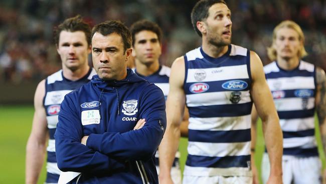 A disappointed Chris Scott leads his team off the ground. Picture: Getty Images