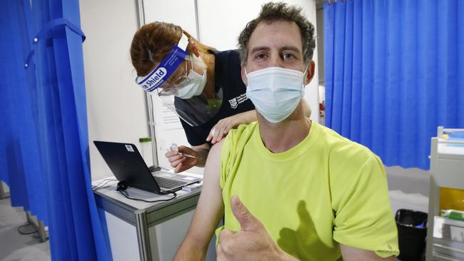 Tradesman Shannon Haslam 43, of Boronia gets the Pfizer vaccine. Picture: David Caird