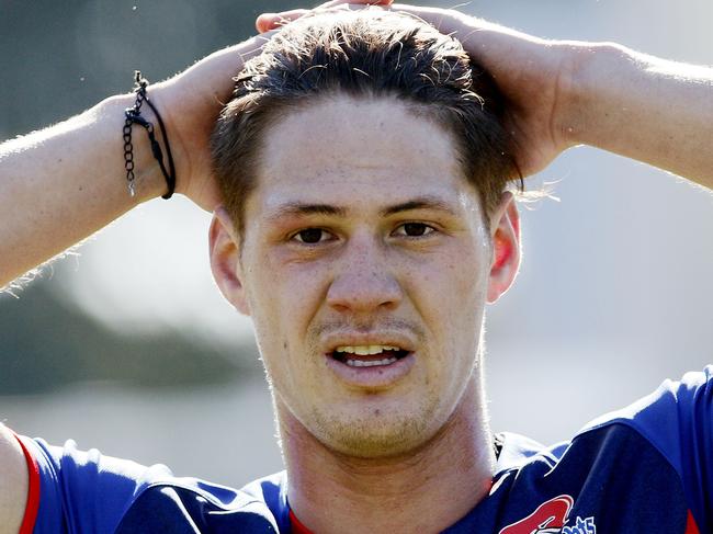 Kalyn Ponga takes a break during a Newcastle Knights team training session at Balance Field in Mayfield, Newcastle, Monday, July 16, 2018. (AAP Image/Darren Pateman) NO ARCHIVING