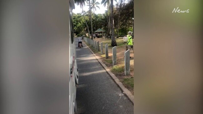 Tourist and council worker clash at Port Douglas beach