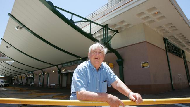 Bruce Bishop in front of the Surfers Paradise Transit Centre and the carpark that was named after him.