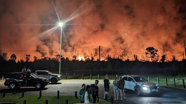 About 30 people watched a huge grass and scrub fire near the Leanyer water park on Wednesday, May 15. Picture: Zizi Averill