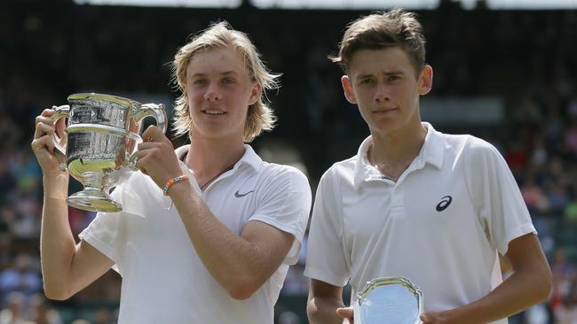 Australia’s Alex De Minaur (R) next to Wimbledon boys champion Denis Shapovalov.