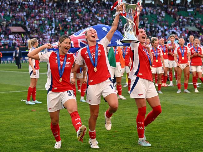 Arsenal’s Matildas contingent parade the UEFA Women's Champions League trophy. Picture: David Ramos/Getty Images