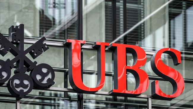 (FILES) In this file photo taken on October 26, 2018 a sign of Swiss banking giant UBS is seen at a branch in Zurich. - After a six-year investigation, judges last year charged the bank and its French subsidiary of laundering proceeds from tax fraud carried out from 2004 to 2012, allegations the bank has denied. Paris courthouse will rule on the case fo the Swiss giant bank UBS on the afternoon of February 20, 2019. (Photo by Fabrice COFFRINI / AFP)