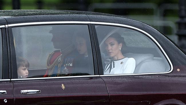 Princess Catherine arrives with Prince William and their children. Picture: AFP